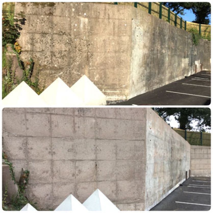 concrete wall before and after pressure washing